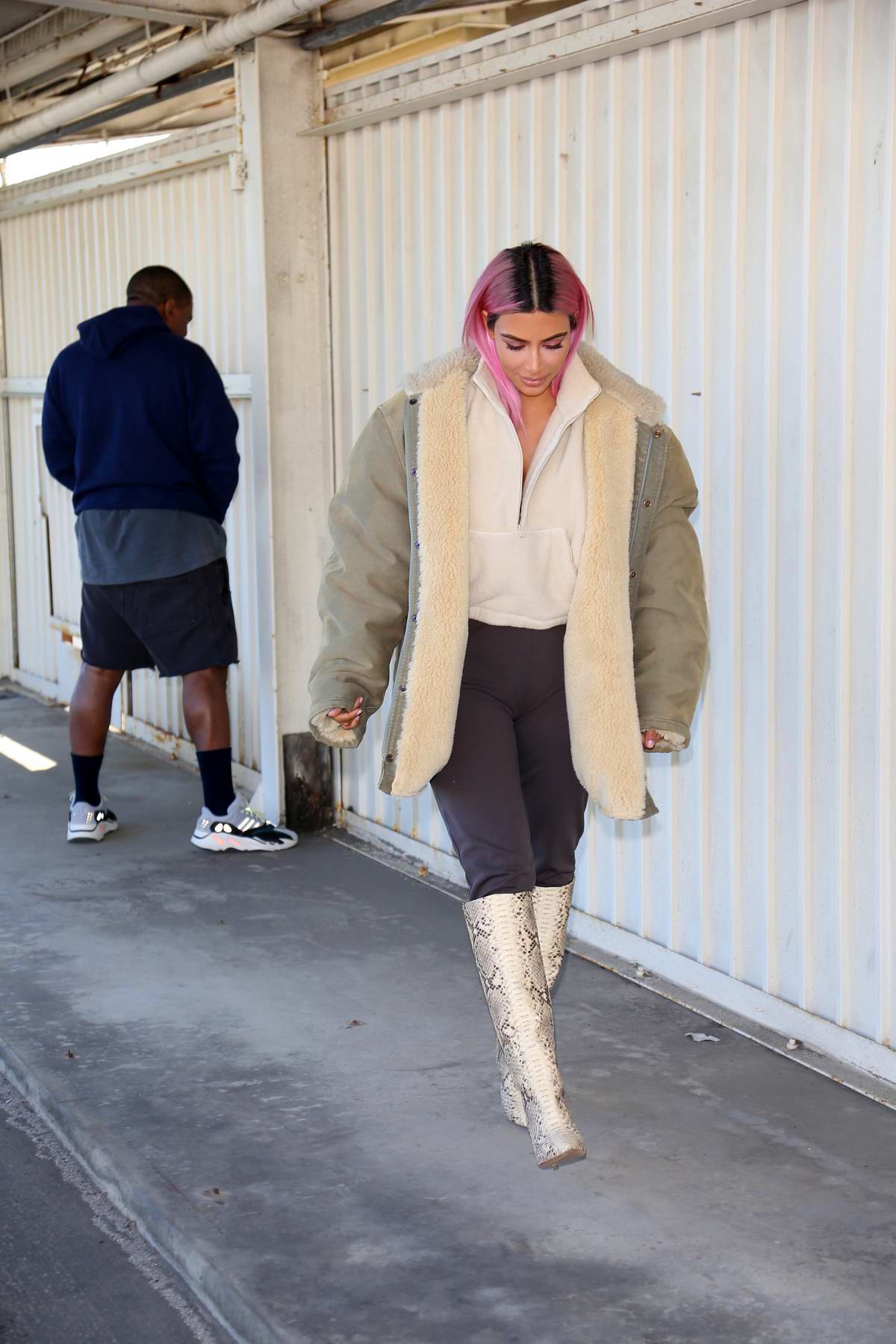 Kim Kardashian rocks snakeskin boots as 