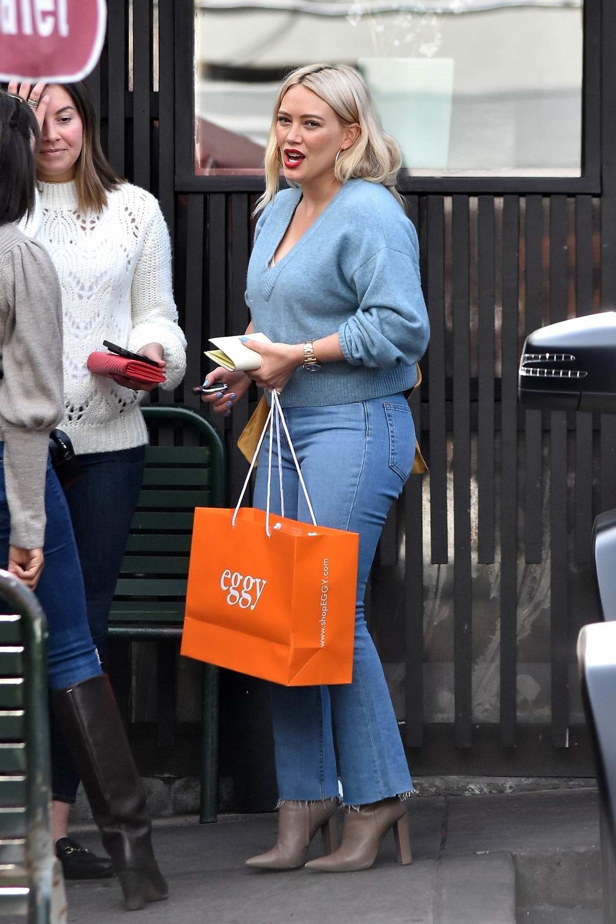 Hilary Duff wore a blue sweater and jeans as she grabs lunch with her