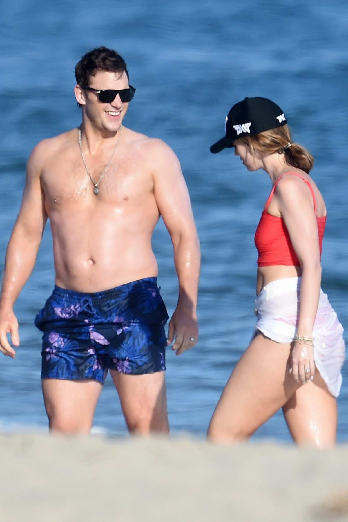 Katherine Schwarzenegger Slips Into A Red Bikini For A Beach Day With