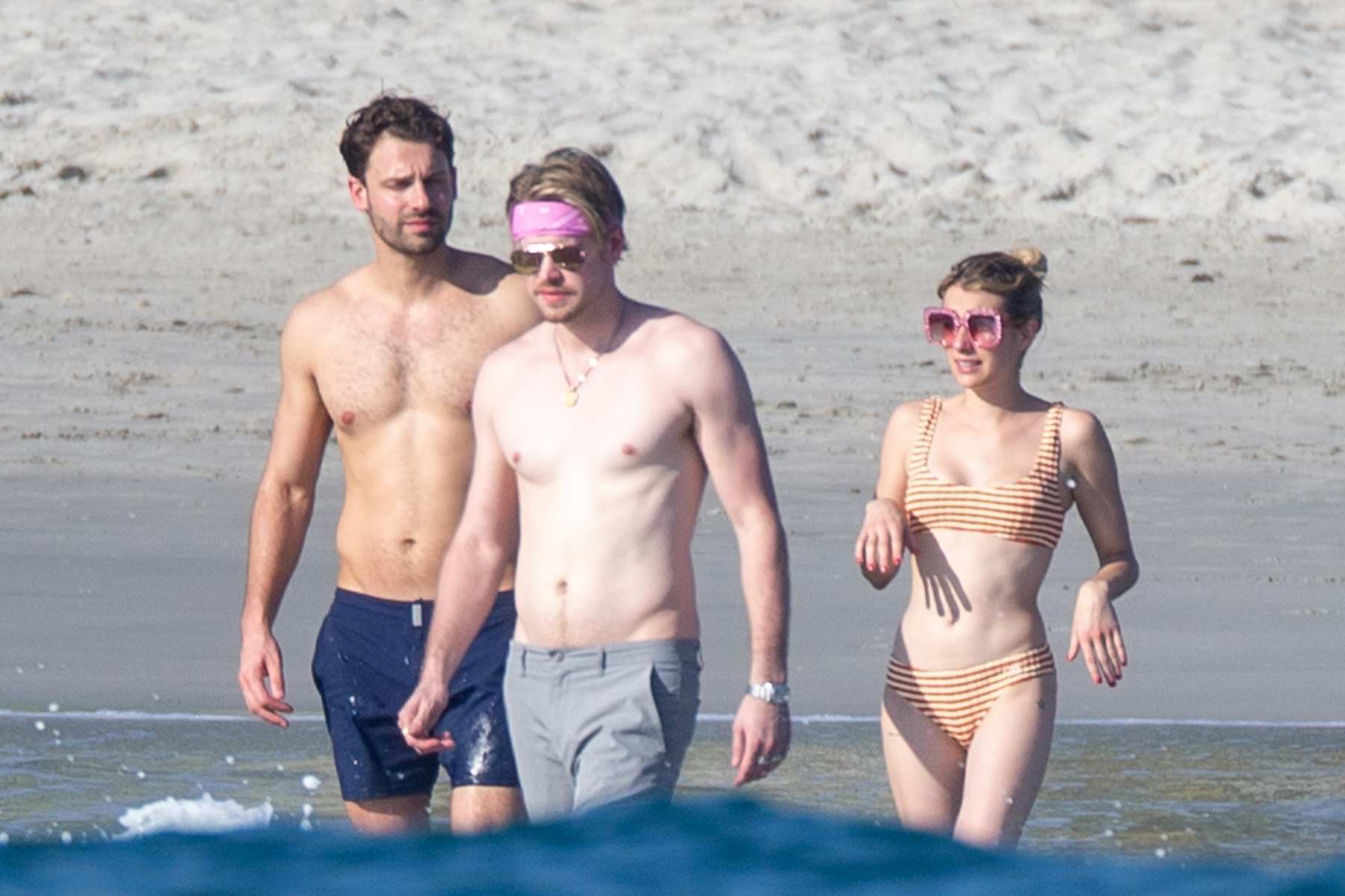 Emma Roberts Wears A Striped Bikini As She Hits The Beach With Friends