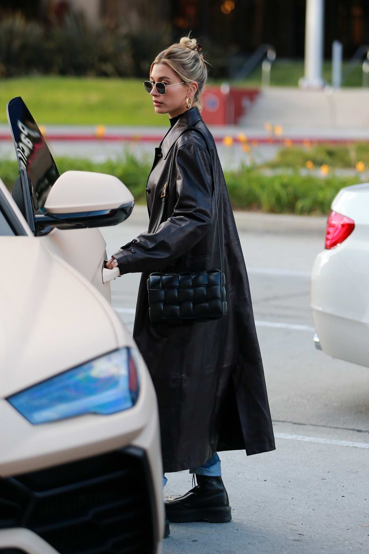 Hailey Bieber Steps Out Wearing A Leather Long Coat As She Heads For Lunch With A Friend In West
