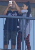 Ariana Grande and a Friend hang out on the balcony of the Grand Hyatt in Rio de Jeneiro, Brazil