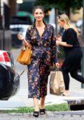 Lily Aldridge wears a Floral Dress while walking out in New York