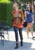 Bella Thorne wears a vintage shirt while out and about in Los Angeles