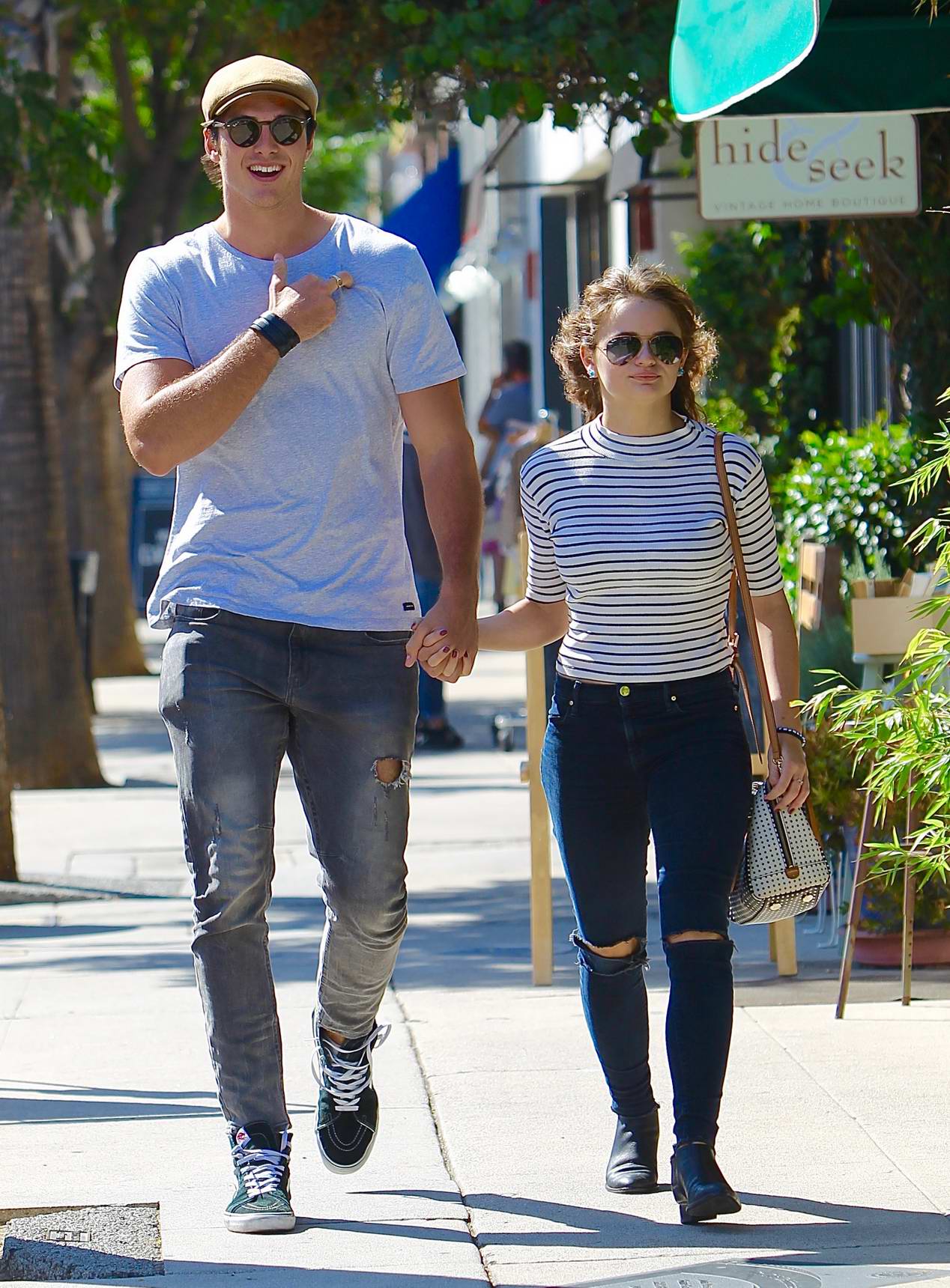 Joey King holding hands with Mystery man while out for lunch in Los Angeles