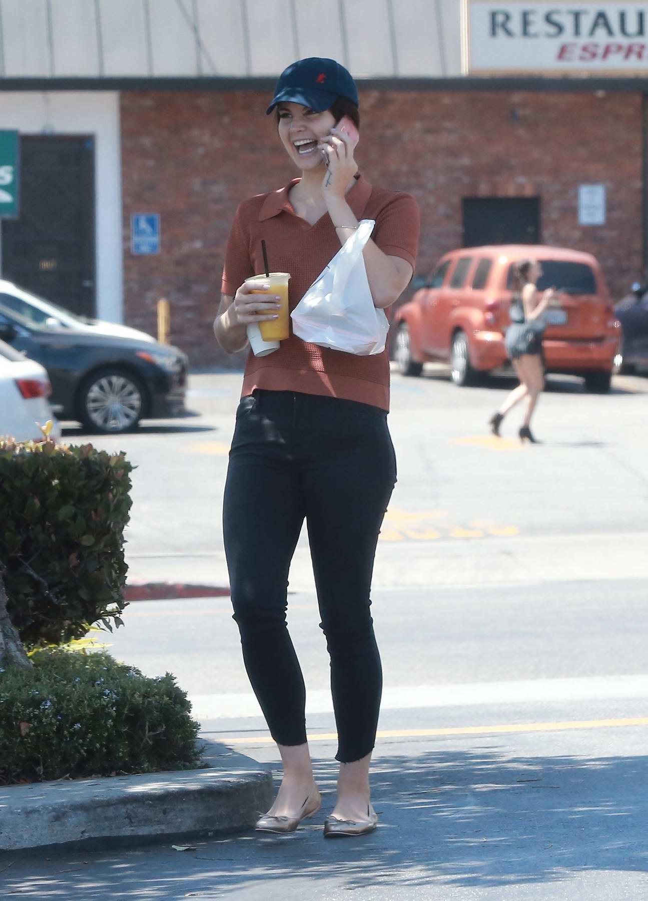 Demi Lovato spotted in a dark grey tee and black leggings as she grabs some  juice