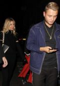 Sienna Miller and Rafferty Law seen leaving Apollo Theatre in Central London