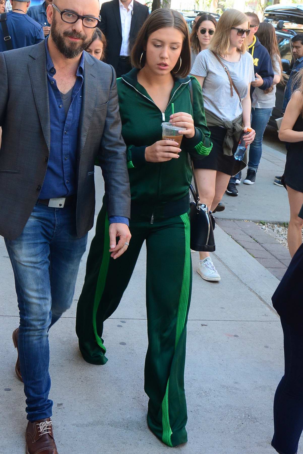 adele exarchopoulos leaves press conference in all green in toronto  canada-120917_3