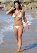 Casey Batchelor in a bikini enjoying a holiday on the beach in Spain