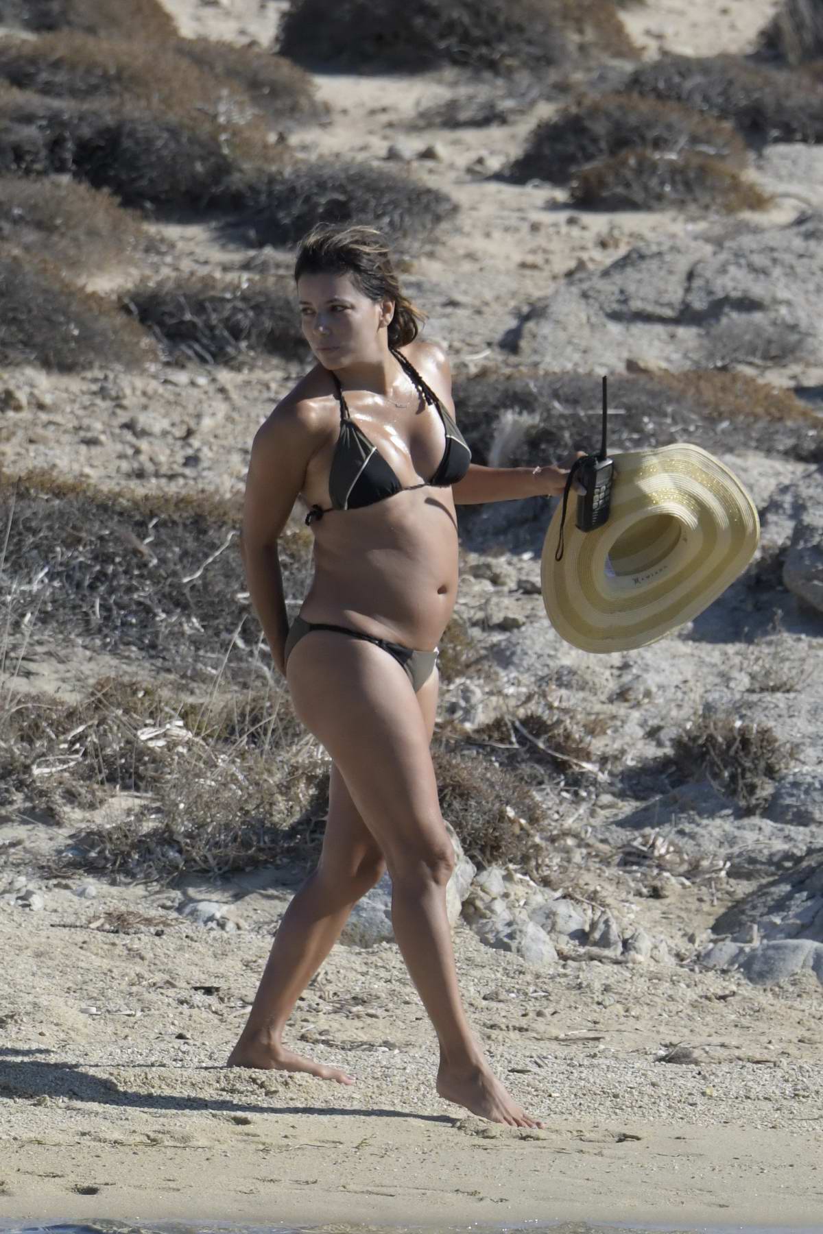 Eva Longoria in bikini with husband Jose Baston and Amaury Nolasco at a  small beach in