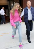 gigi hadid wearing a pink outfit as she returns to her apartment in new  york city-121117_4