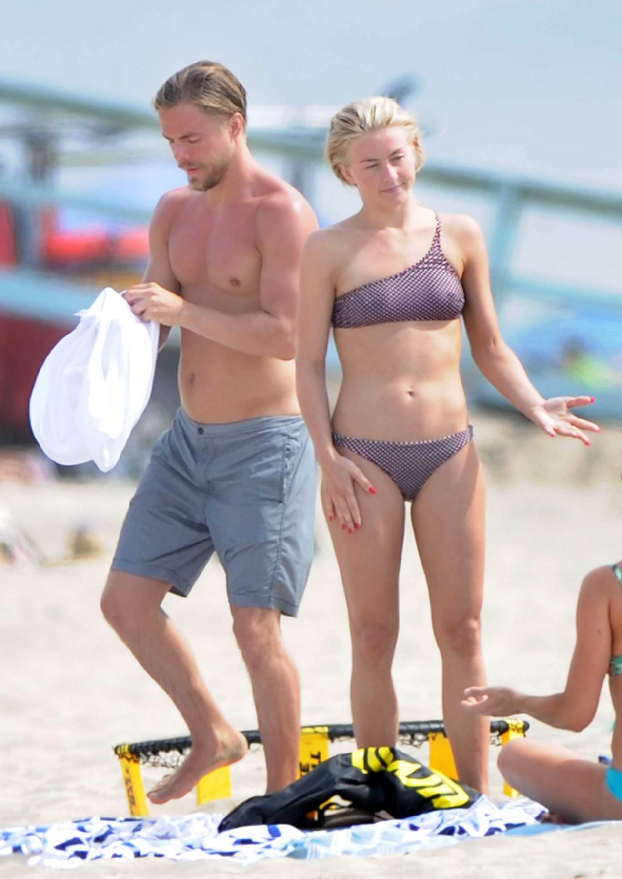 Julianne Hough in a bikini while bodysurfing with husband Brooks Laich