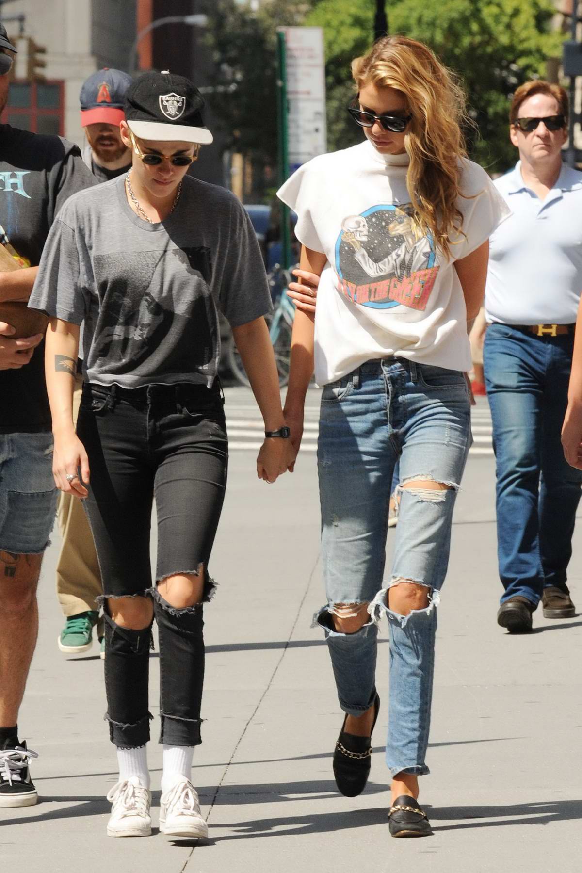 Kristen Stewart and Stella Maxwell hold hands while taking a walk in ...