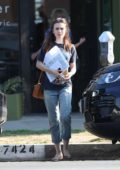 Lily Collins shopping for art with her mother in Los Angeles