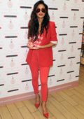 Nicole Scherzinger dressed in all red while promoting her new perfume CHOSEN at the Trafford Centre in Manchester, UK