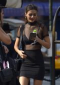 Victoria Justice rocks a see through top while heading to Fashion