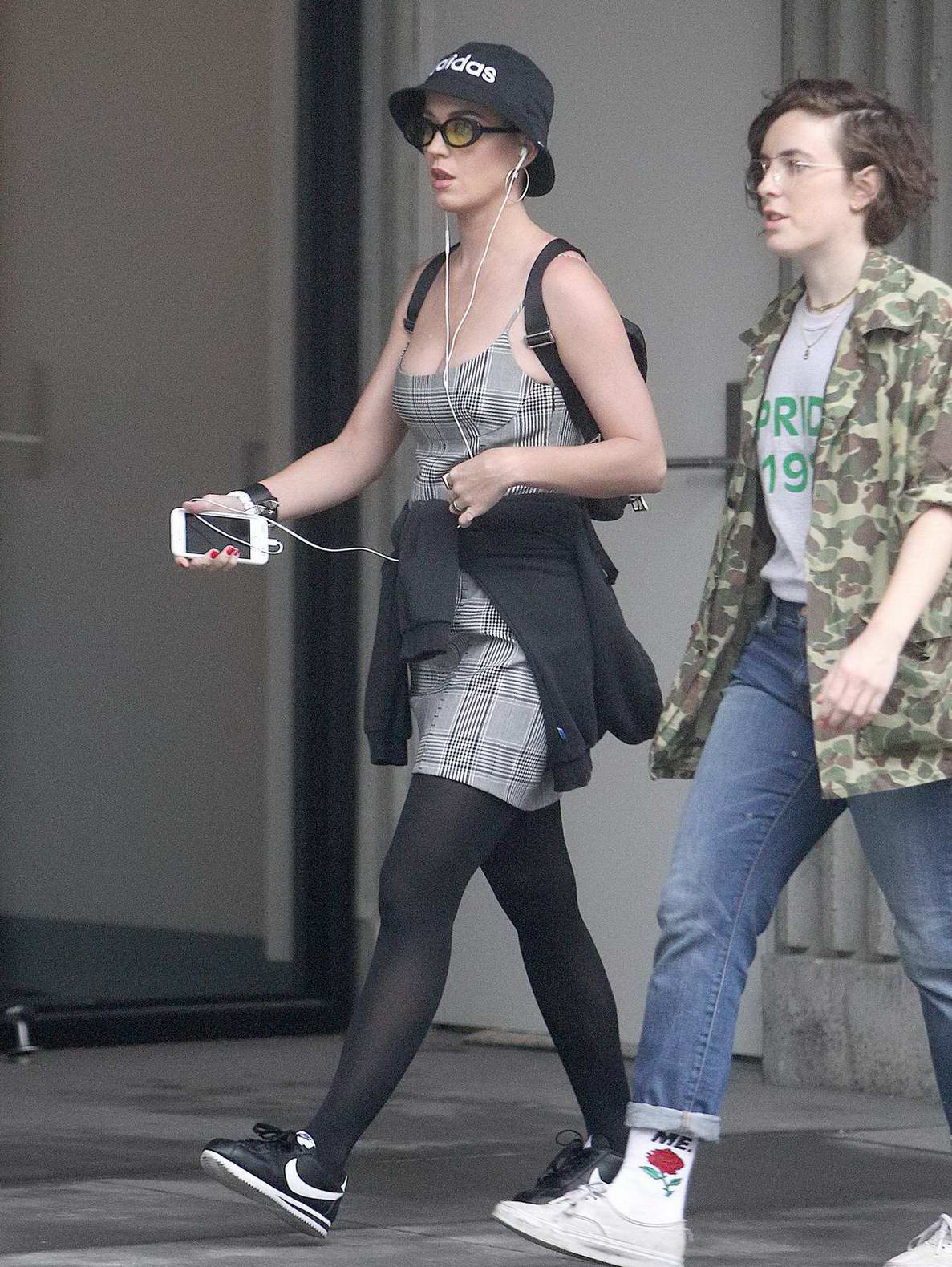 Lily Collins seen wearing a pink jacket and black leggings while filming  scenes for 'Emily in