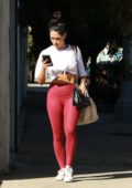 Addison Rae looks fit in a black sports bra and leggings while leaving her  Pilates class