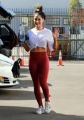 Addison Rae looks fit in a black sports bra and leggings while leaving her  Pilates class