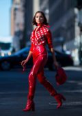 Olivia Culpo in all red wearing MSGM with a Tods handbag in New York City