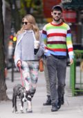 Sienna Miller and Ex Tom Sturridge walk their dog at the dog park in the West Village in New York City