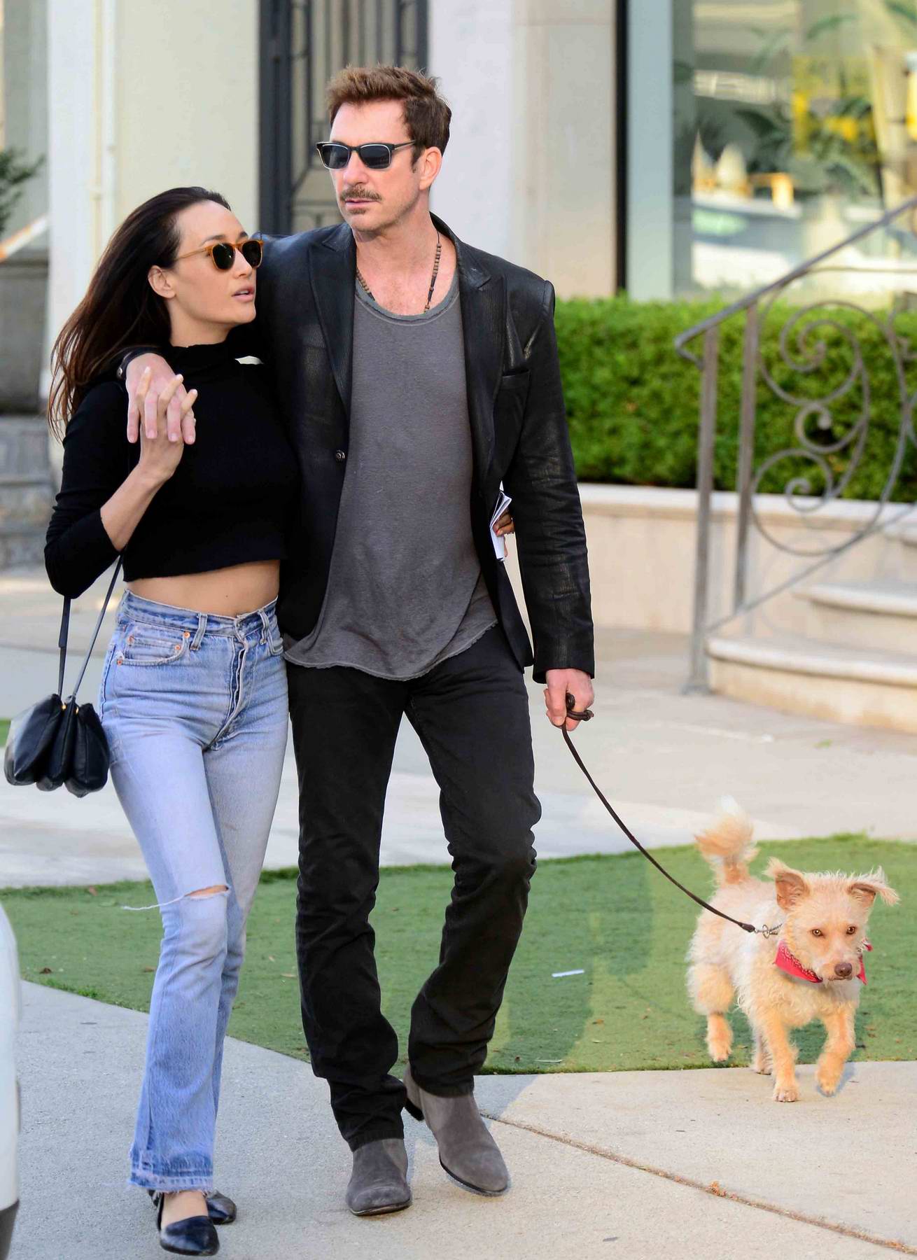 Maggie Q and boyfriend Dylan McDermott out for a walk with their dog on