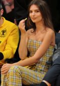 Emily Ratajkowski wears a yellow plaid jumpsuit at the Houston Rockets vs LA Lakers game in Los Angeles