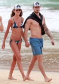 Izabel Goulart wears a string bikini while she enjoys the ocean with beau Kevin Trapp after celebrating christmas in Fernando de Noronha, Brazil
