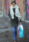 Katie Holmes holiday shopping in the snow in New York City