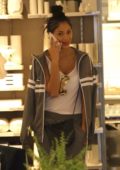 Nicole Scherzinger chats on the phone while shopping for home goods at CB2 in West Hollywood, Los Angeles
