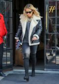 Rita Ora wore a shearling jacket as leaving her hotel in New York City