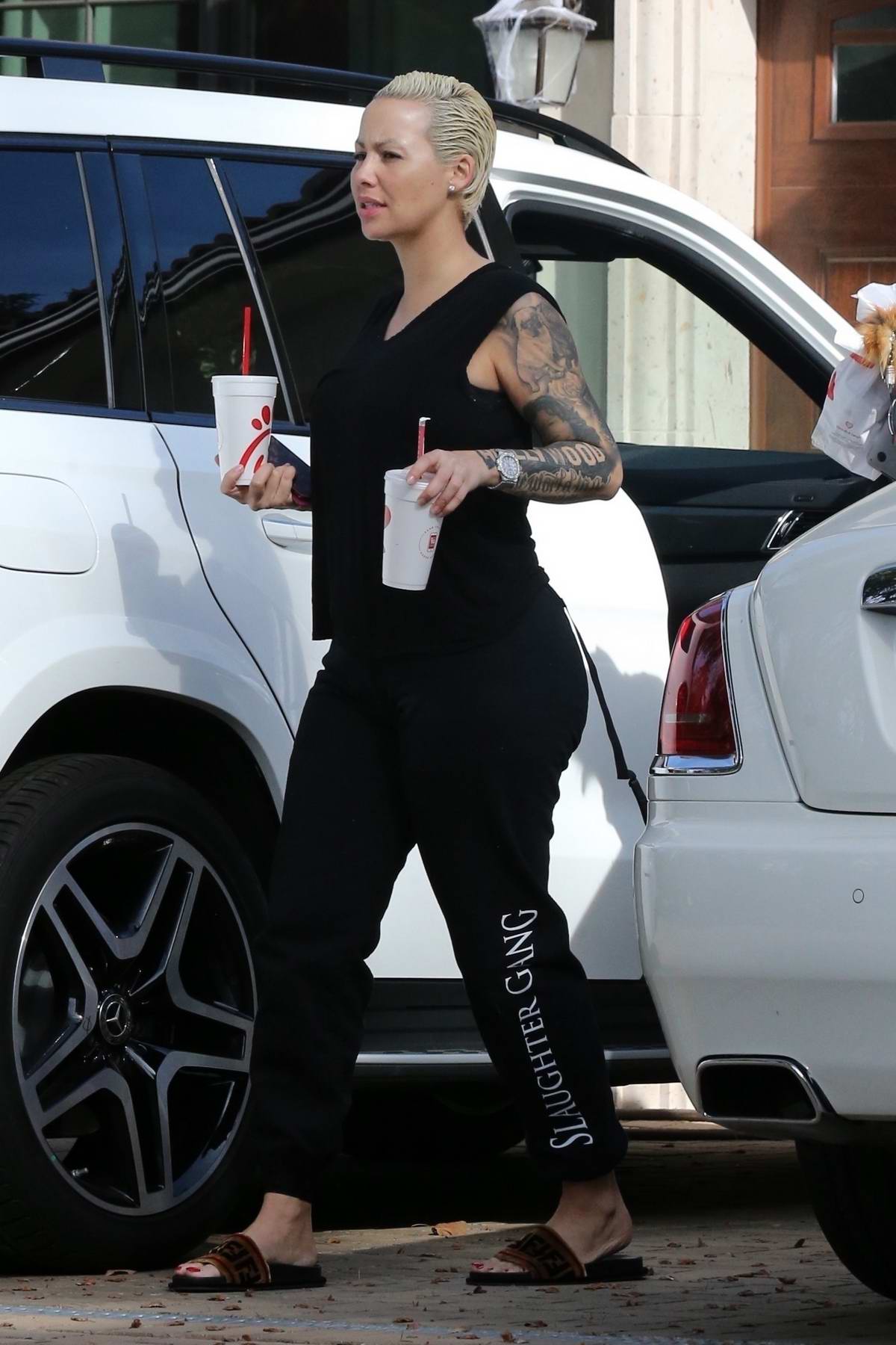 Kendall Jenner leaves the studio in a black corset top in Calabasas,  California