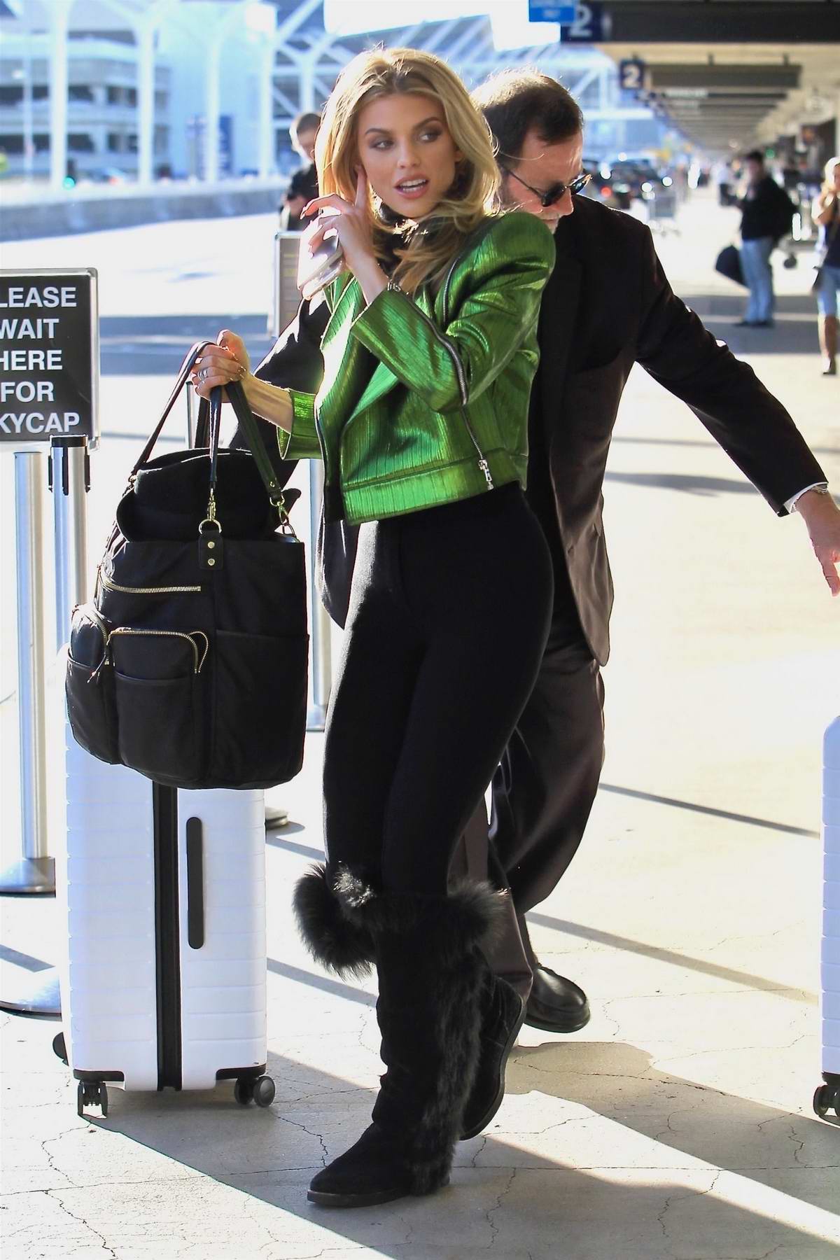 Jennifer Lopez rocks a pair of colorful leggings as she hits the