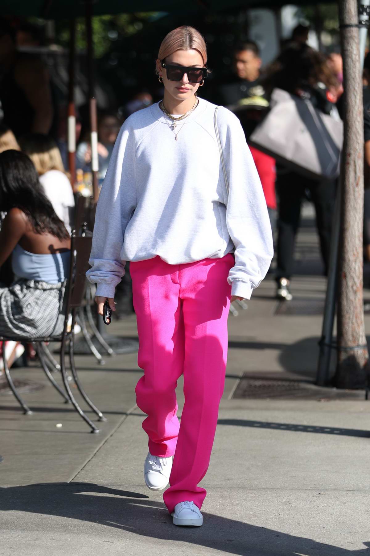 Who made Hailey Baldwin's pink pants, crop top, sweatshirt, and