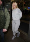 Iggy Azalea wears grey sweatsuit as she touch down at LAX airport in Los Angeles