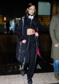 bella hadid rocks a black DSQUARED2 outfit as she touch down at Heathrow airport, London