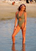 Georgia Harrison spotted wearing a green swimsuit on the beach in Dubai