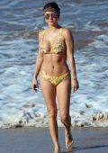 Arianny Celeste enjoys the ocean in a yellow floral print bikini while on vacation in Maui, Hawaii