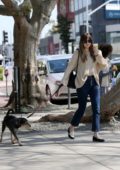 Shopping at A.P.C with her dog and a friend on Melrose Place in