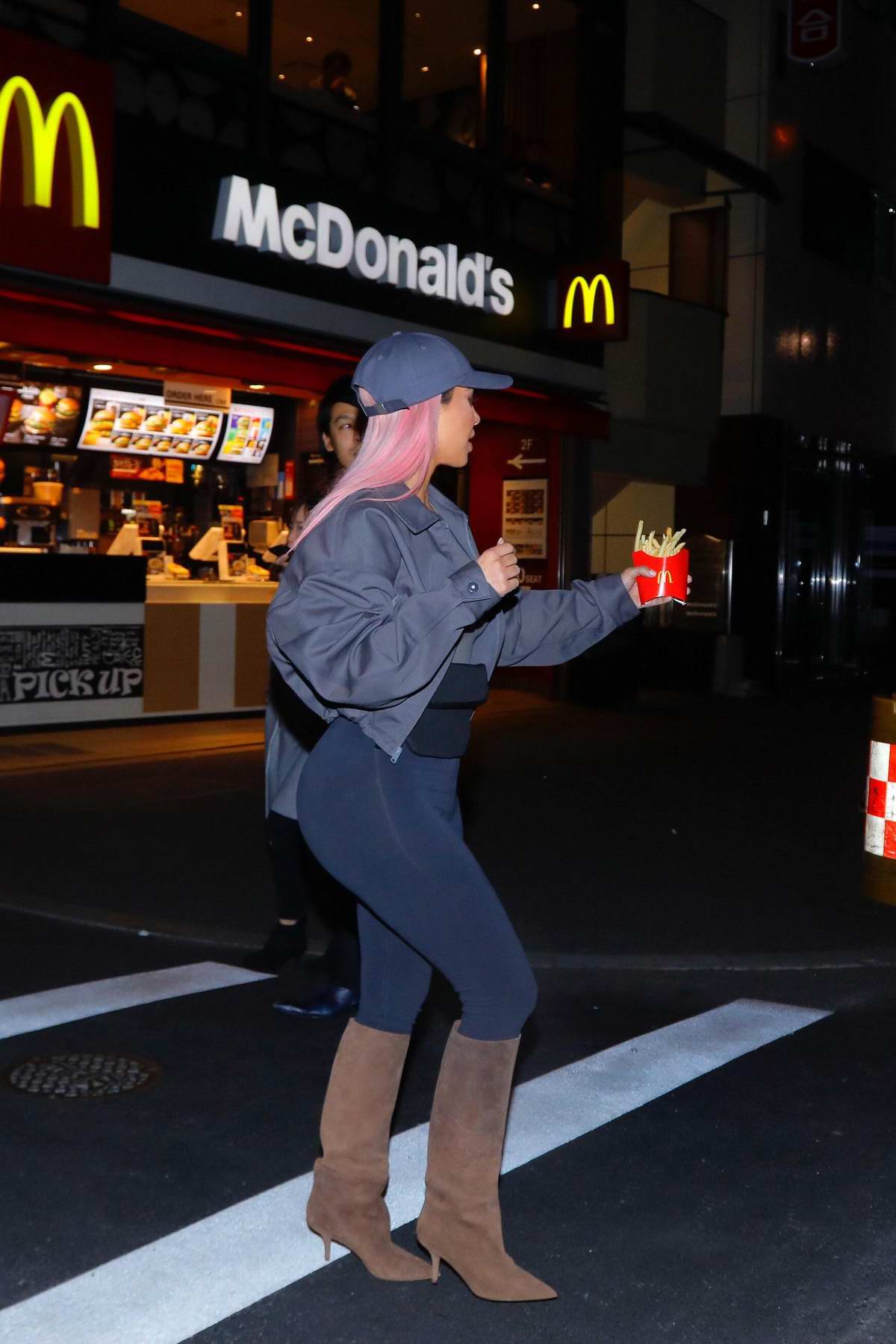 kim kardashian grabs some french fries at mcdonald's in tokyo, japan ...