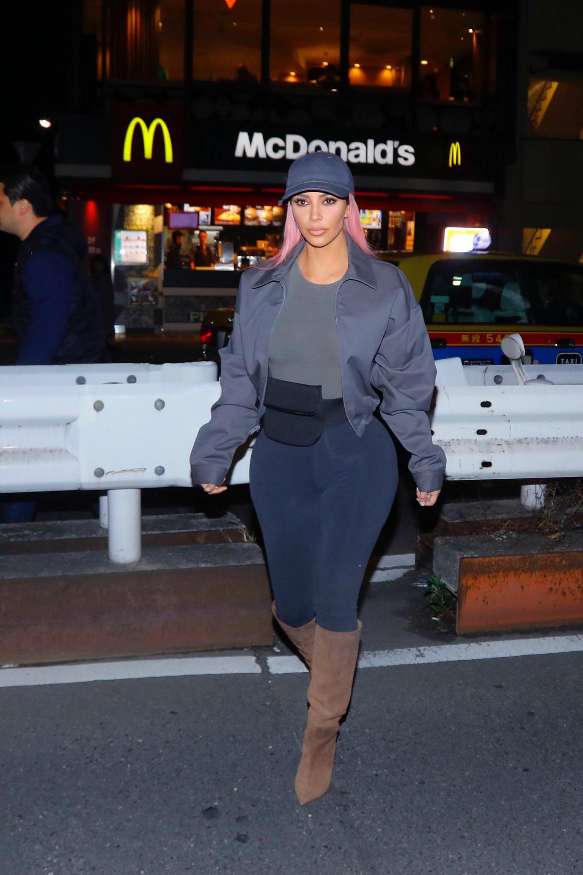 Kim Kardashian grabs some french fries at McDonald's in Tokyo, Japan