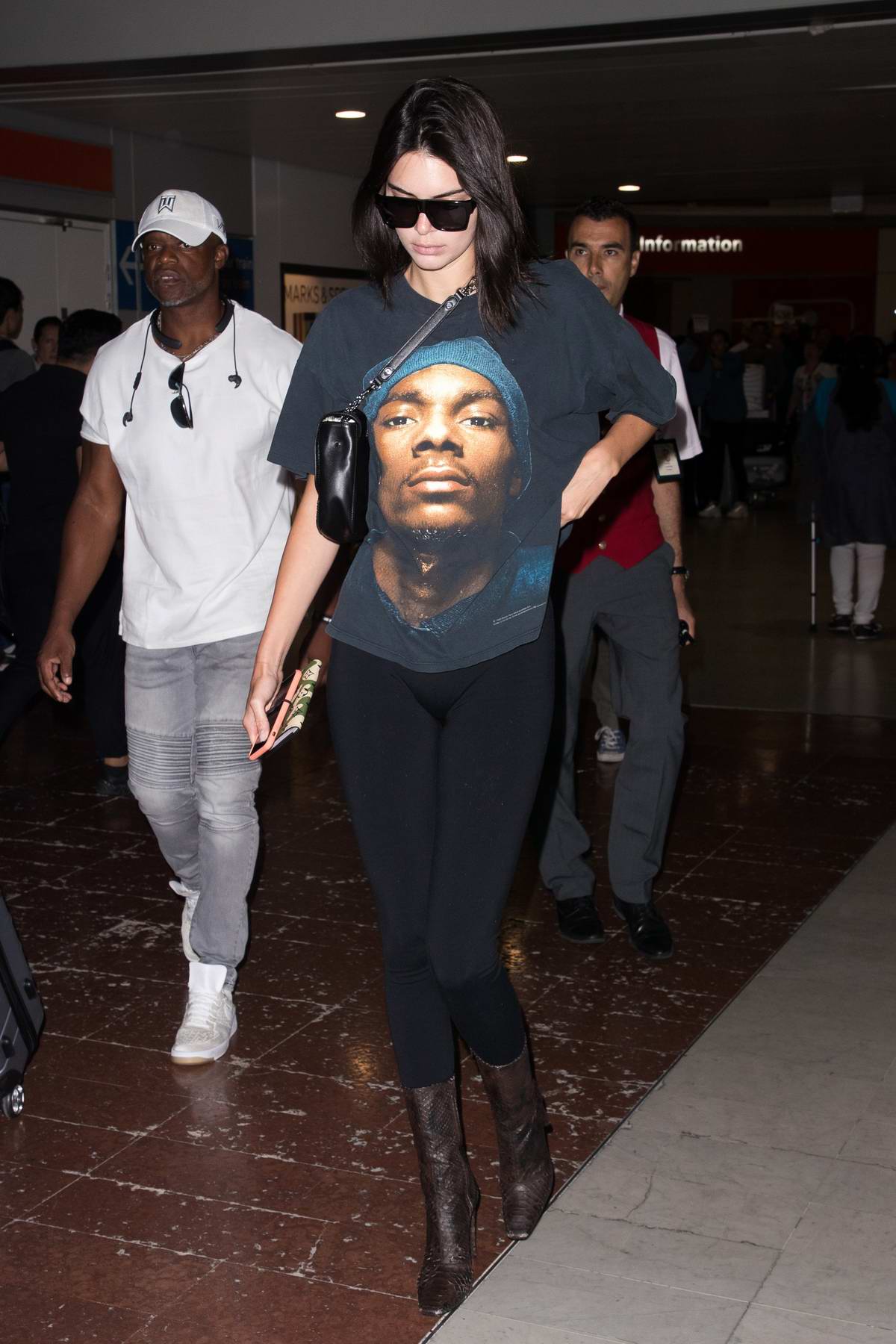 kendall jenner makes a low-key arrival at charles de gaulles airport in  paris, france-100918_7