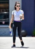 Lucy Hale wears black leggings and white top as she makes a coffee run in Studio City, Los Angeles