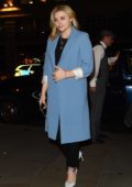 Chloe Grace Moretz wears a powder blue coat and black trousers as she dines at Scott's restaurant in London, UK