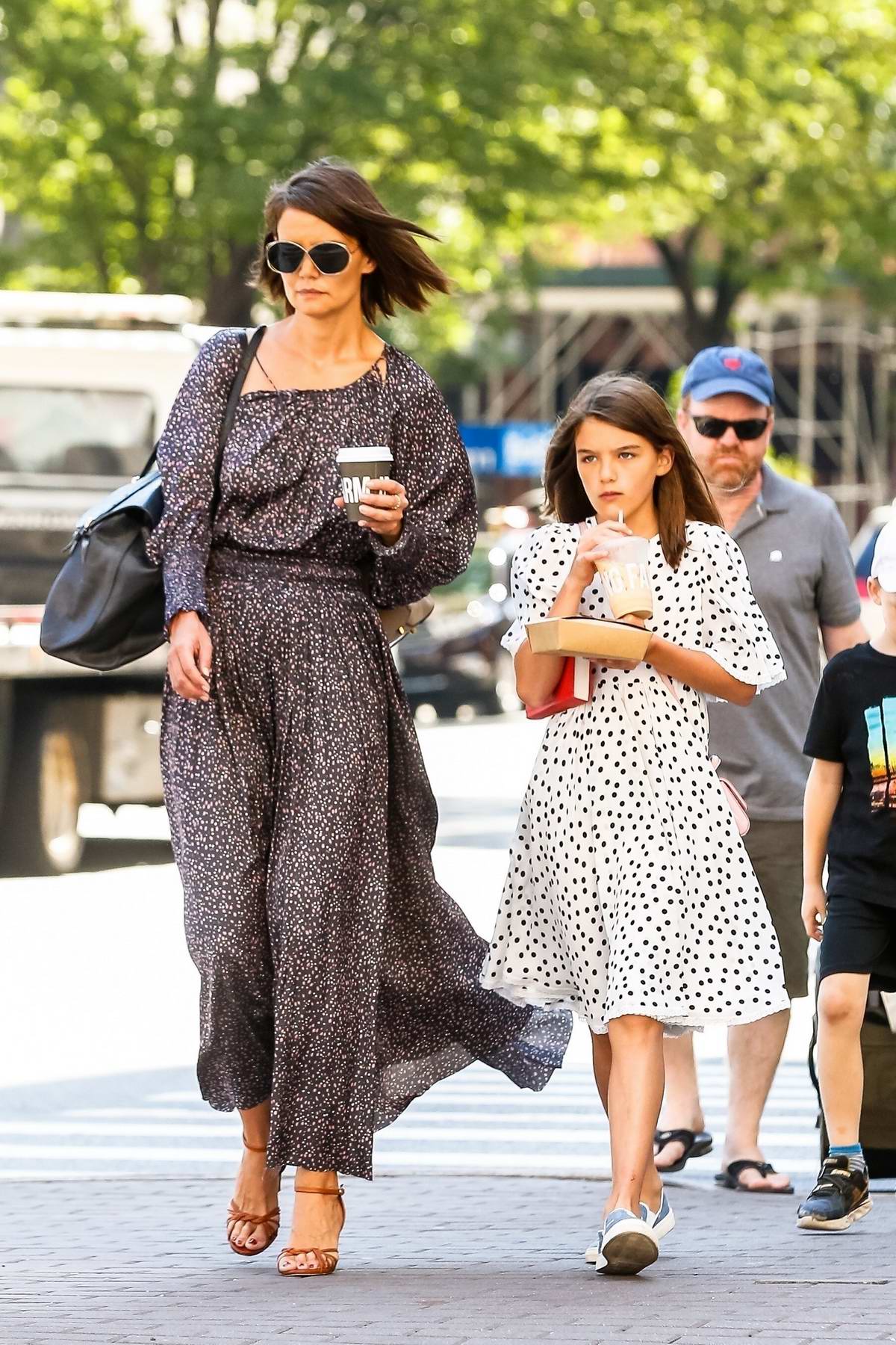 Katie Holmes and daughter Suri Cruise take a walk after breakfast in Soho, New  York City