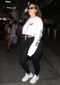 Ashley Graham Wears Nude Leggings at LAX Airport