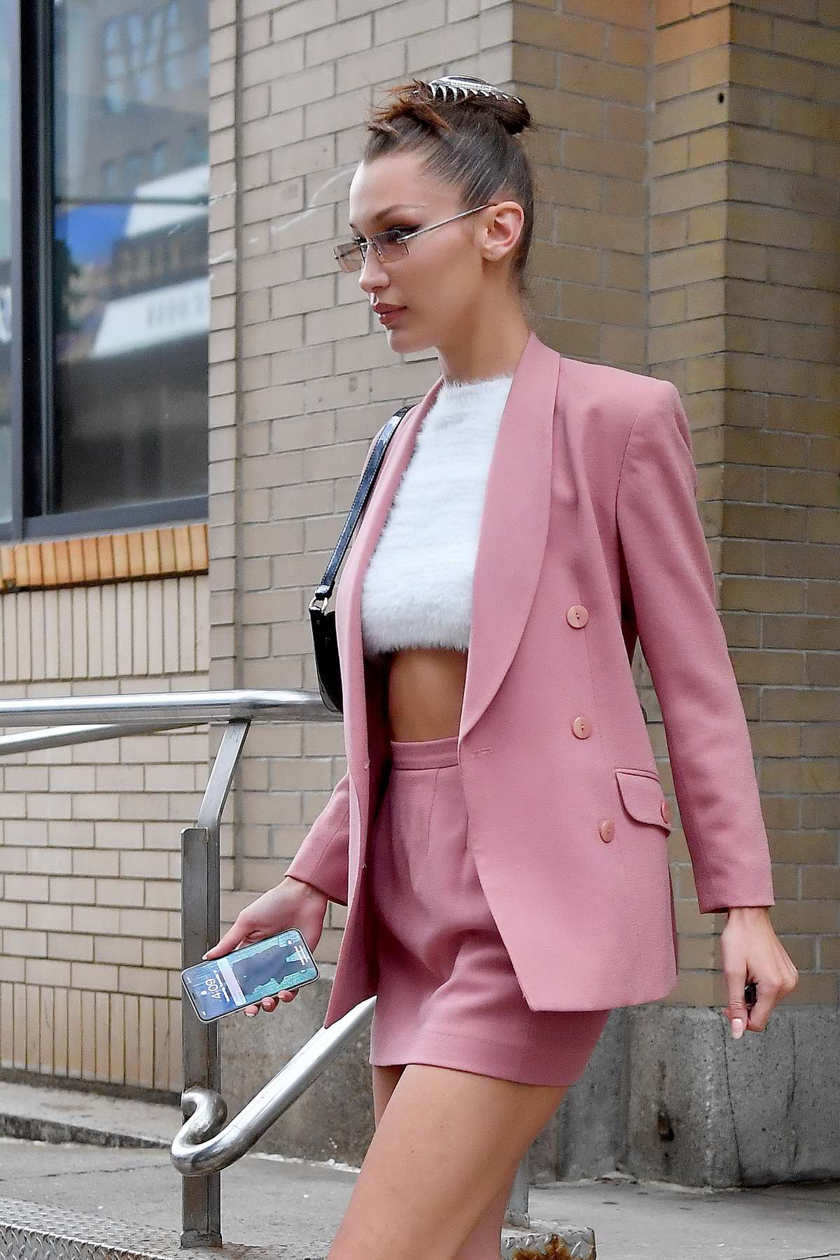 bella hadid looks pretty in pink as she heads out in noho, new york ...