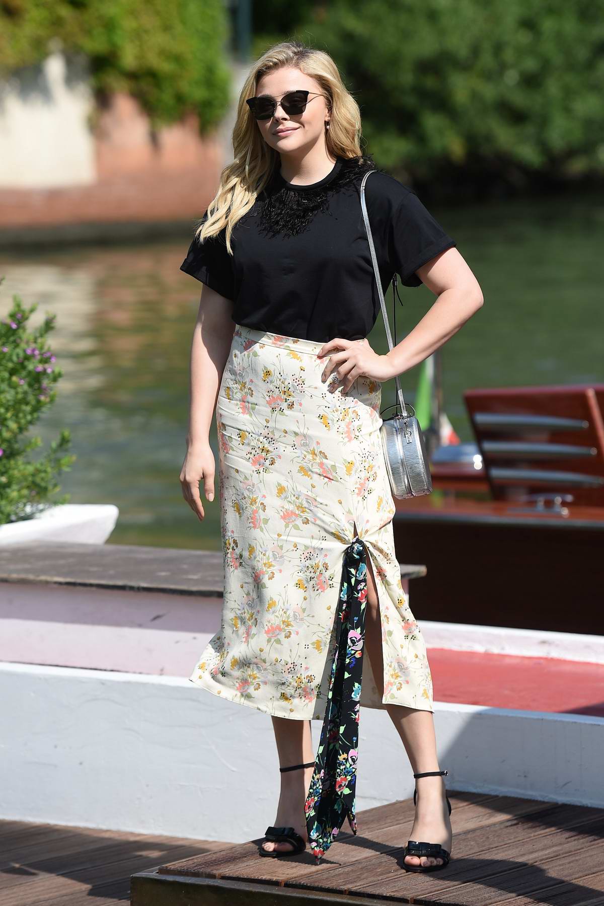 Chloe Grace Moretz spotted in a black top with a floral print