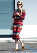 Emma Roberts steps out in a colorful stripe dress as she stops by an Urgent Care in Hollywood, Los Angeles