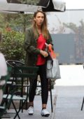 Jessica Alba hangs out with her class mates outside a spin class in Los Angeles